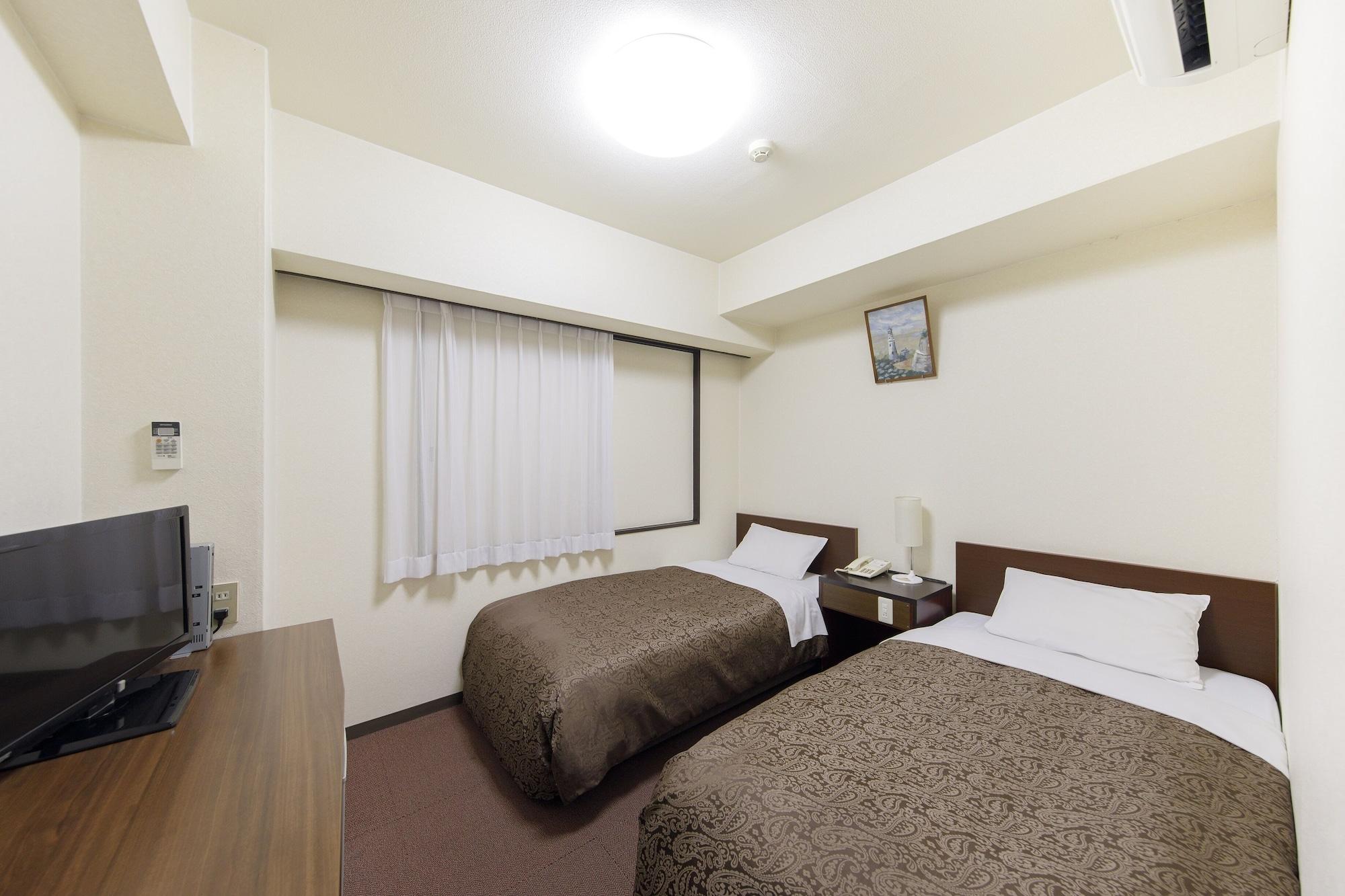 Dai-Ni Sunny Stone Hotel Suita Exterior foto
